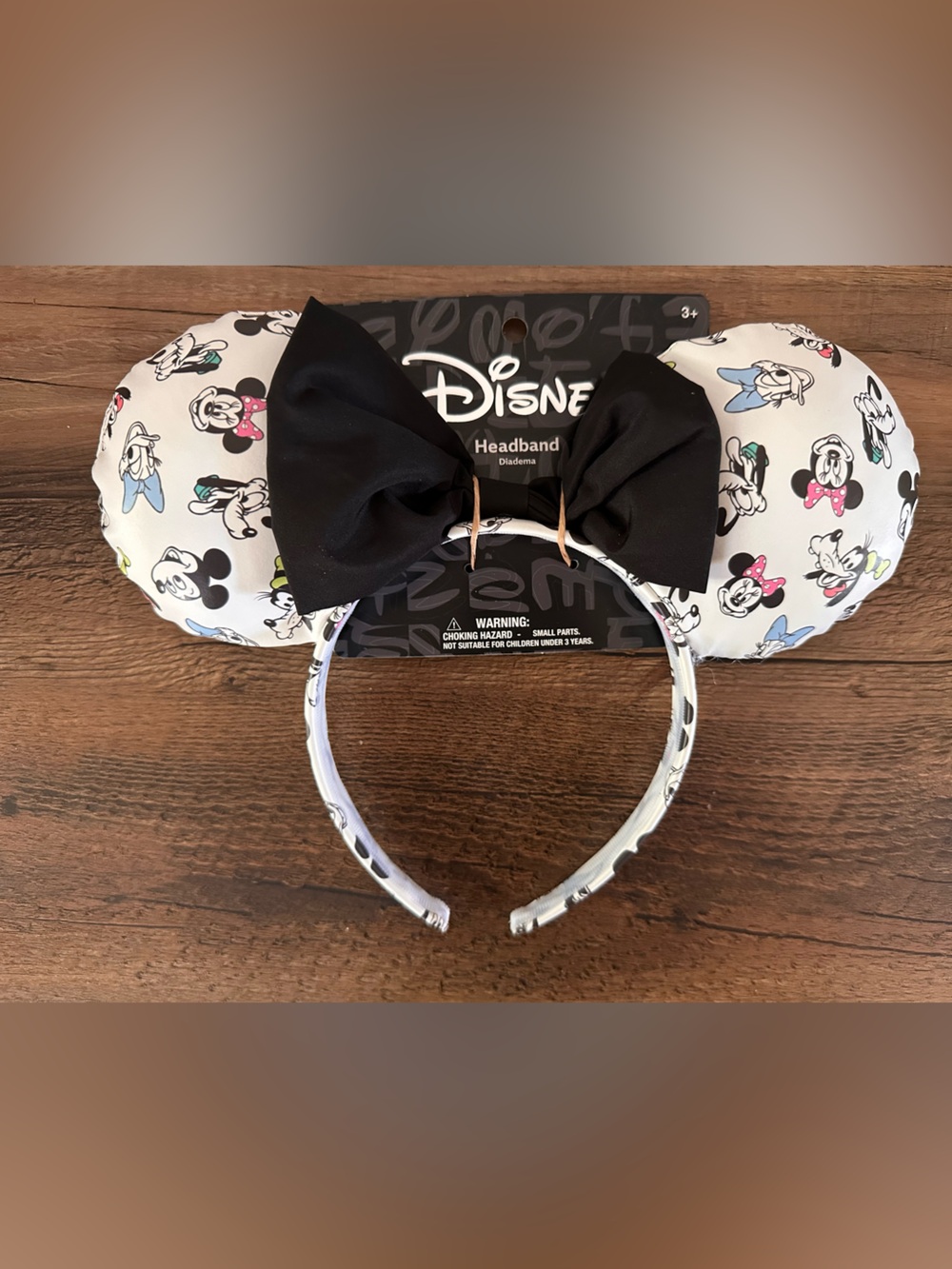 Disney White Minnie & Friends Pattern Ear Headband with Black Bow